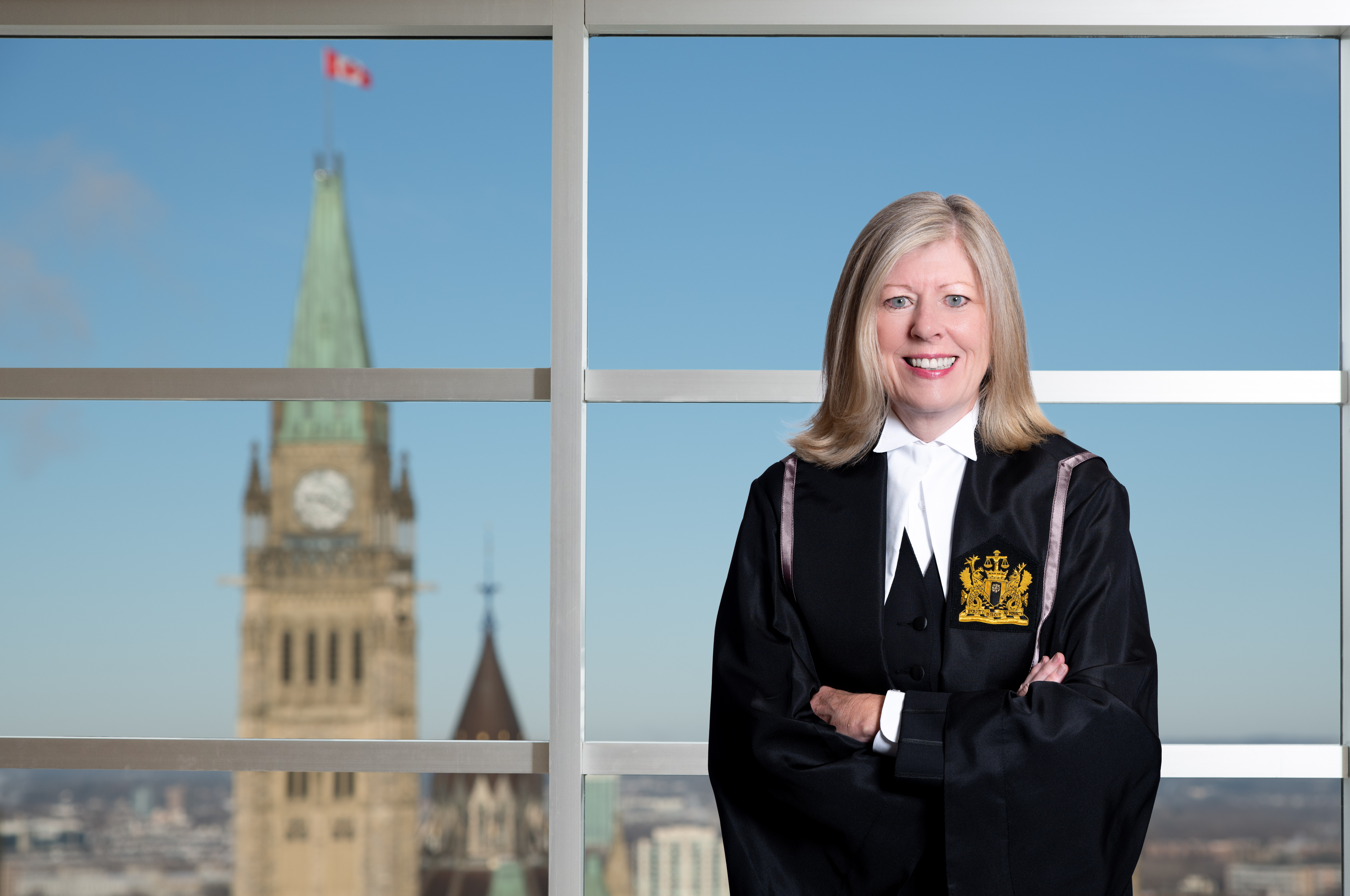 Madame la juge adjointe Catherine A. Coughlan